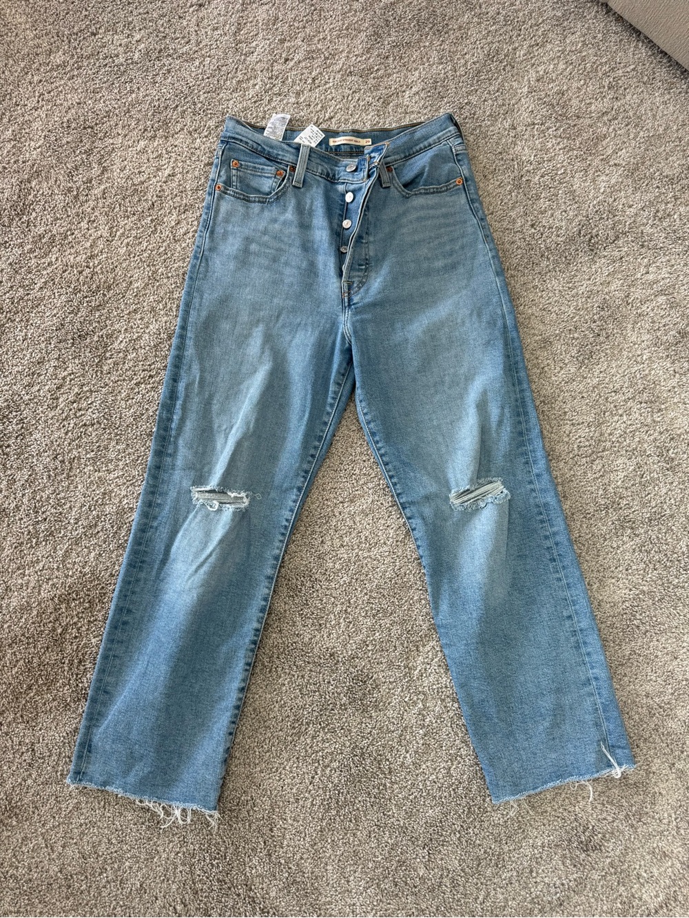 High-Rise Light Blue Distressed Levi Women's Jeans